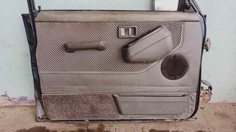 GUARNECIDO PUERTA DELANTERA IZQUIERDA