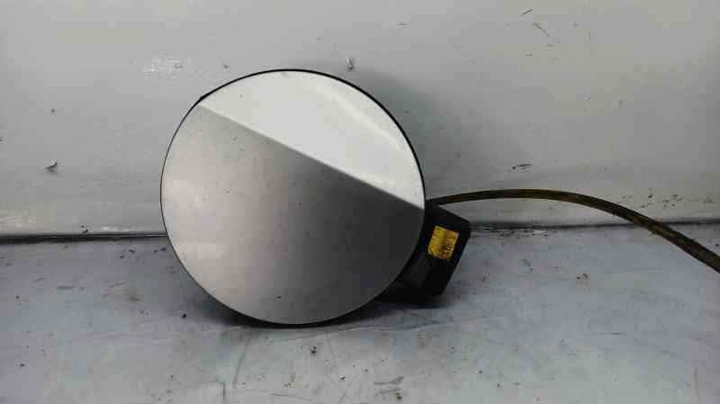 TAPA EXTERIOR COMBUSTIBLE