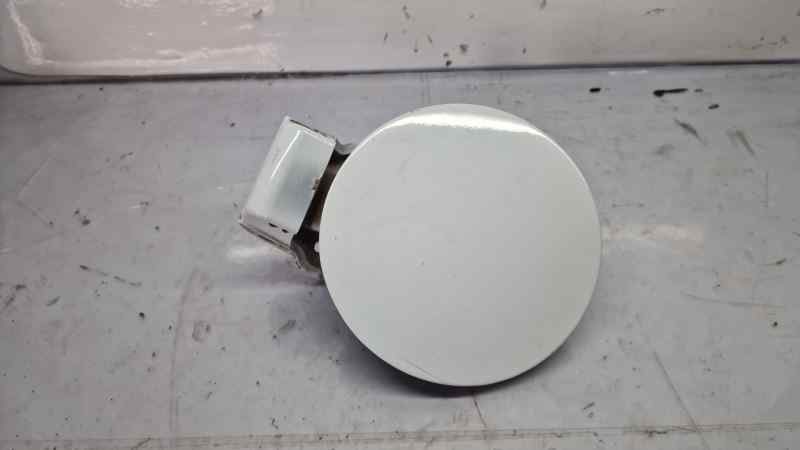 TAPA EXTERIOR COMBUSTIBLE